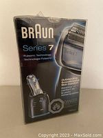 Front view of Braun Series 7 790cc shaver in sealed retail box highlighting product and features