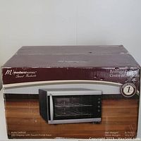 Photo of the box showing the Modern Homes Beverage Centre with front image, branding and features.