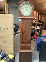 Full view of tall wooden longcase clock case