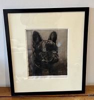 Front view of the framed black wood frame and off-white mat featuring a French bulldog portrait