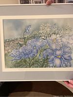 Full view of Phyllis Wood's original blue floral watercolour showing detailed flowers and background.