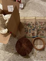 Overall lot contents: needlework, embroidery frame, basket with lid, wool yarn