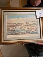 Full view of the framed print depicting the Battle of Queenston, 1813 with the surrounding frame and glass intact.
