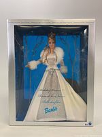 Full front view of boxed Holiday Visions Barbie doll showing detailed gown and packaging.
