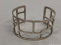 Front view of 925 silver openwork cuff bracelet showing geometric open rectangular design