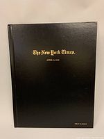Front cover of hardcover book binding of The New York Times April 9, 1929 edition, black with gold embossed text.