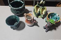 Top view photo displaying all five ceramic pieces on a table, showing size and arrangement.