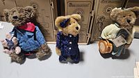 Three Boyds Collection bears in their original boxes: Billy Ray, Molly, Olivia