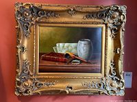 Frontal view of painting and frame