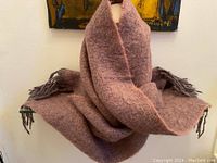 Wrap displayed draped on a mannequin, showing full size and overall color appearance in soft lavender with grey tones.