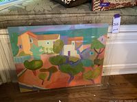 Full view of landscape art and acrylic frame