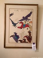 Framed lithograph showing colorful birds, a red horseman, and embossed white horseman. Three signatures visible on the top.