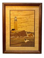 Full front view of marquetry wood inlay lighthouse framed artwork showing the entire piece and wood frame.