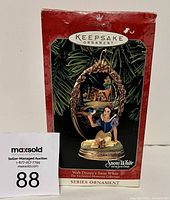 Photo of the Hallmark box showing the Snow White ornament from the series.