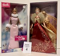 Both Barbie dolls in original boxes, Twilight Gala and Glamorous Gala, shown side by side