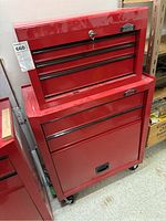 Two red Job Mate tool chests stacked, showing overall condition and appearance