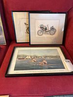 Three framed art pieces: two original automobile paintings and one Currier & Ives reprinted lithograph of a rowing match, showing size, framing, condition