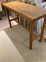 Full view of oak hall table showing rectangular top and legs