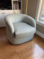 Front-left three-quarter view showing overall shape and cushion