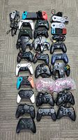 Overhead view of all controllers and the handheld console