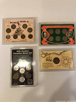Four sets of collectible coins shown, including World War II Obsolete Coin Collection, American Frontier Nickel Set, 20th Century Canadian Nickel Set, and a One Cent Voyageur Set on a sailing ship card.