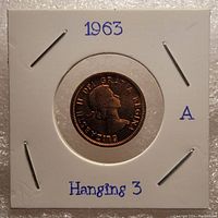 Obverse side of the 1963 Canadian one cent coin showing Queen Elizabeth II with the year 1963 and 'Hanging 3' notation handwritten on the holder.
