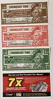 Front view of three Canadian Tire Money notes with denominations 50 cents, 10 cents, and 5 cents.