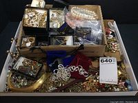 Mixed box of loose bracelets, necklaces, earrings, brooches and rings