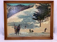 Full view of framed oil painting showing ski scene