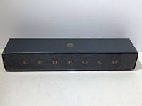 Closed Leupold box with gold Leupold logo and branding