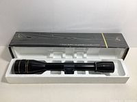 Scope in foam tray with original box lid behind