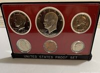 Front of the plastic case showing six Bicentennial U.S. coins in proof condition: penny, nickel, dime, quarter, half dollar, and dollar coins.