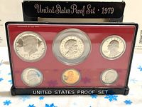 Front view of the 1979-S United States Proof Set coins displayed in a clear plastic case with red background insert, showing all seven coins including Kennedy half dollar and Eisenhower dollar.