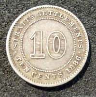 Reverse side of the 1886 Straits Settlements 10 cents coin showing large '10' in center with text 'STRAITS SETTLEMENTS TEN CENTS 1886' around.