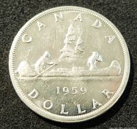 Front of the 1959 Canadian silver dollar showing the canoe design with three figures and the inscriptions Canada, Dollar, and the year 1959.