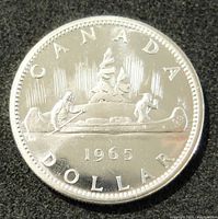 Obverse image showing the voyageur canoe design with indigenous person and year 1965 with inscriptions 'CANADA DOLLAR'.