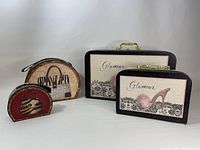 Four decorative boxes in two sets, showing the front facing designs and arrangement.