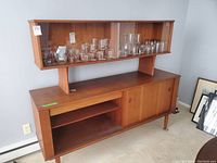 Front view of entire buffet with glass hutch and lower cabinet