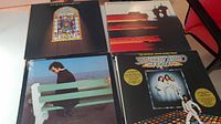 Top left showing The Alan Parsons Project and The Cars LPs, along with Boz Scaggs and Saturday Night Fever soundtrack albums.