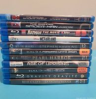 Stacked Blu-ray movies showing all titles clearly on spines.