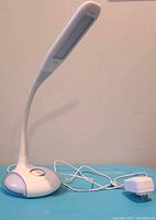 Full lamp showing flexible neck and LED light panel on top