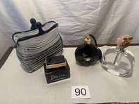 All items in the set including the perfume bottle, two perfume dispensers, and decorative glass lamp are displayed together on a gray surface with a white backdrop.