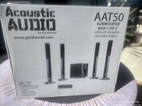 Box of Acoustic Audio AAT50 subwoofer set showing satellite speakers included in box 2 as per label.
