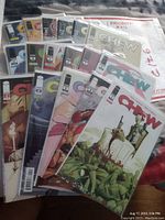 Seventeen Chew issues fanned out in bags on a table