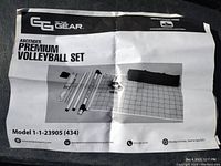 Instruction sheet showing Ascender Premium Volleyball Set components including poles, net, and carry bag