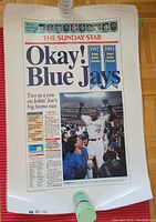 Laminated poster styled as a newspaper front page from The Sunday Star celebrating the Blue Jays 1993 World Series championship featuring Joe Carter.