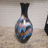 Full view of the large 15-inch vintage drip glazed pottery vase on a granite countertop, showing the shape and glaze pattern.