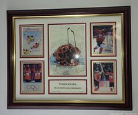 Front view of the framed plaque showing central hockey artwork and surrounding photos with title and edition label below