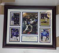 Framed plaque containing 5 photographs of Toronto Blue Jays 2015 ALDS championship moments, in a faux cherry wood frame with matting