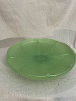 Top-down image showing overall shape, color, and rippled ridge design dividing bowl sections.